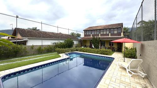 Jardim Capricornio Casa | Casa c piscina a 700m da Praia de Caraguatatuba SP