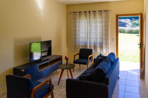 Vila Britania Casa | Casa com grande quintal em Campos do Jordão