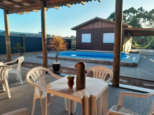 Torres Casa | Casa com piscina na praia Itapeva, Torres
