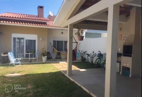 Cassino Casa | Casa Confortável Praia do Cassino para 7 Pessoas