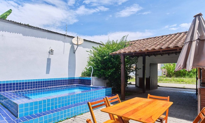 Jabaquara Casa | Casa Cravo e Canela com 3 Quartos, ar e Piscina