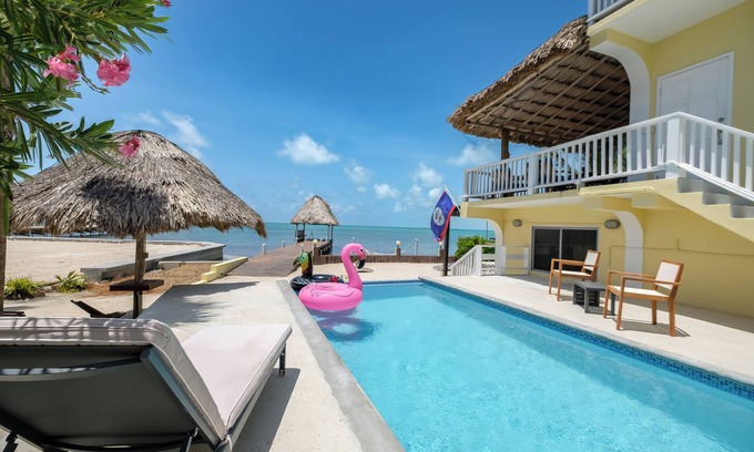 Boca Ciega Casa | Casa privada completamente renovada frente al mar en la playa con muelle privado