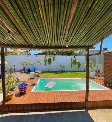 Balneario Arroio do Silva Casa | Casa de Praia, alto padrão, estilo industrial, 50 metros do mar.