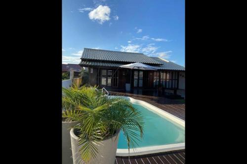 Jaguaruna Casa | Casa de Praia & Piscina Aquecida SC