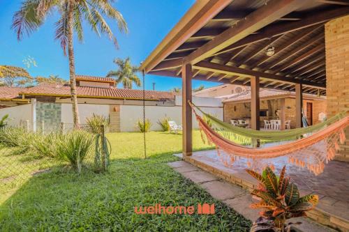 Horto Casa | Casa em Ubatuba com área gourmet e acesso a rio