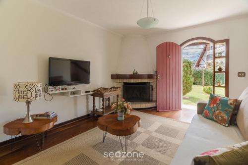 Jardim Andira Casa | Casa espaçosa c/lareira em Campos do Jordão RAS175