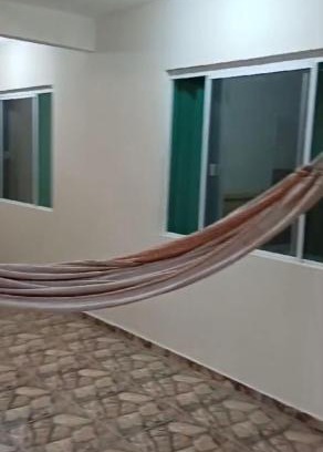 Praia Grande Casa | Casa Fundos na Enseada - 2 Quartos