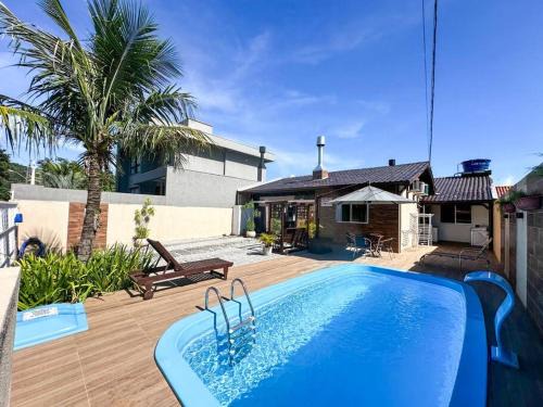 Ze Amandio Casa | CASA GOLFINHO 348 - casa com piscina e lazer para até 8 pessoas