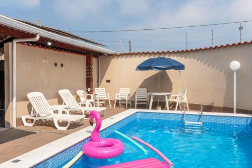 Jardim Real Casa | Casa Lindíssima e Espaçosa com 2 Piscinas - Adulto e Infantil, Perto da Praia, Opção da Piscina Adulto Aquecida Cobrado à Parte, 4 Quartos Frente as Piscinas, Área Gourmet Completa com Churrasqueira, Forno e Fogão a Lenha, Mesa de Bilhar, Lareira na Sala