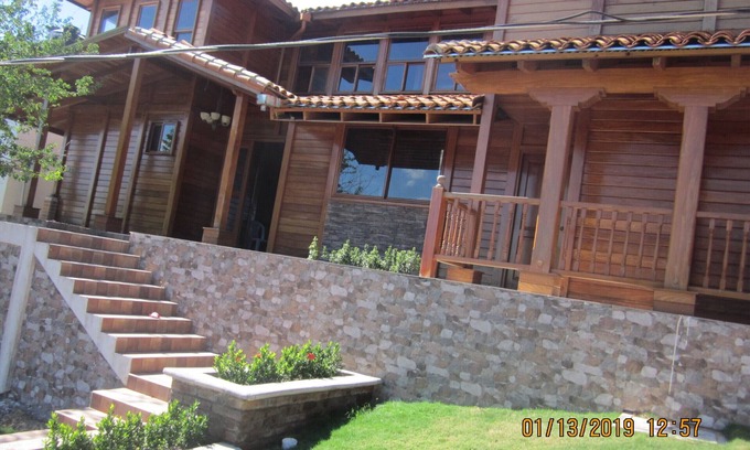 Puerto Sandino Casa | Casa Madera: Vista Expansiva y Confort Espacioso