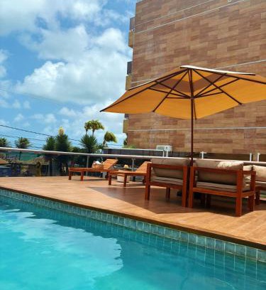 Tambau Casa | Casa Oiti: à Beira-Mar de Tambaú na melhor localização de João Pessoa - Piscina, Aconchego e Lazer