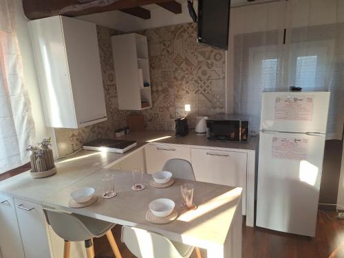 Massenzatico Apartamento | Casa vacanze Le Rondini