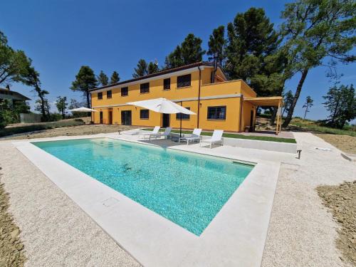 Belvedere Ostrense Casa | Casale Medi - Nuove ed eleganti case con giardino, vista e piscina condivisa