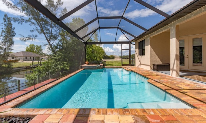 Trafalgar Casa | Casita Cabo Coral en el Canal de acceso al golfo con piscina climatizada y spa