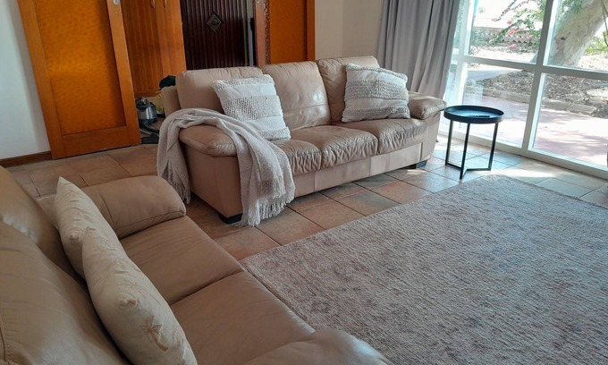 Beachlands Casa | Central, 2 minute drive to beaches, town and hospital.