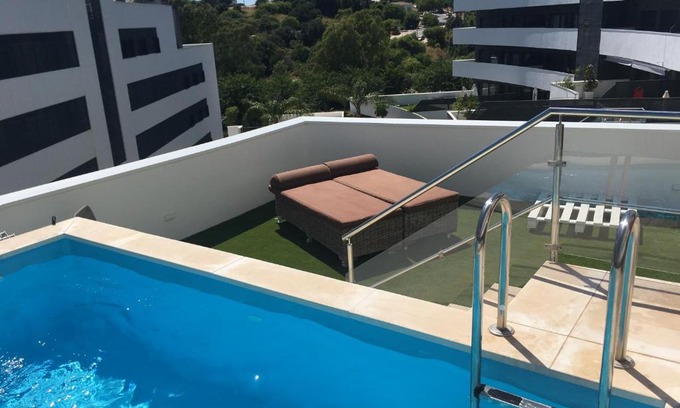 Estepona Apartamento | central bright apartment, community pool and own private pool on splendid terrace, garage, beach 900m, mountains 200m