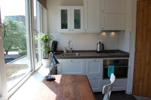 Lasonder-Zeggelt Apartamento | Central-Day Inn