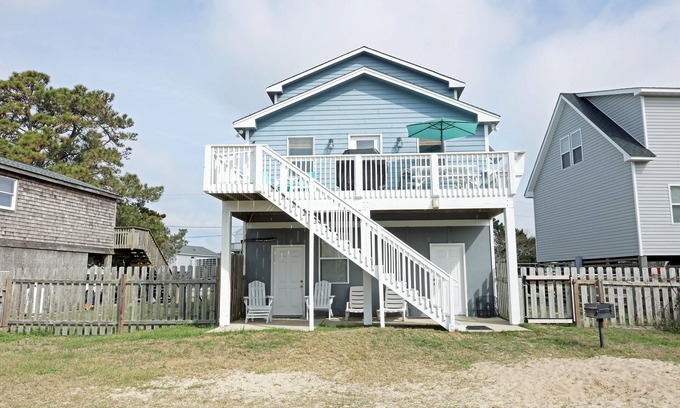 Colington Harbour Casa | CH113- Beautiful 3 BR on Canal- Stunning Interiors- Sunset Views- Fire Pit!
