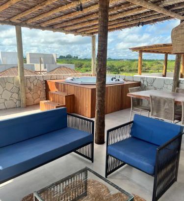 Cajueiro da Praia Apartamento | Chalé Encantador com Rooftop Privativo