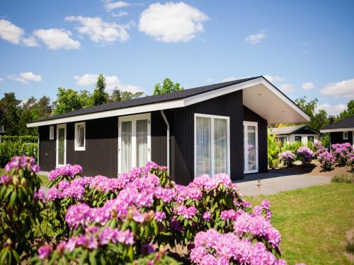 Municipality of Veldhoven Chalet De Esquí | Chalet in Netherlands by Scenic Pond