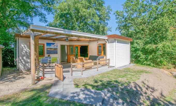 Uden Casa | Chalet in the woods with veranda and sauna