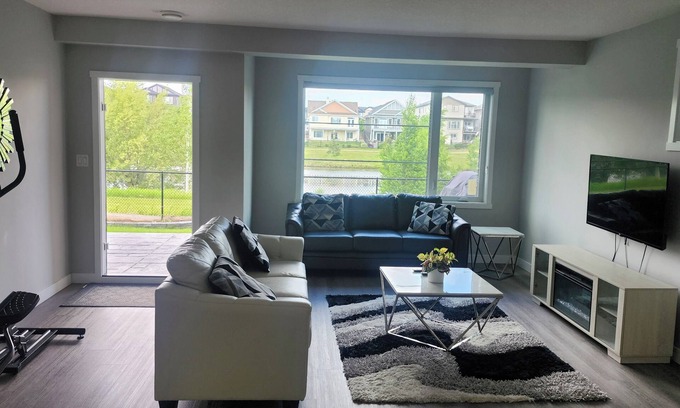 Beaumont Casa | Charming 1-bedroom walkout pond backing suite with fitness machine, AC and bbq