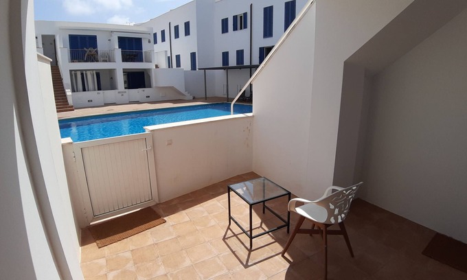 Pilar de la Mola Apartamento | Charming 2BR/2BA apartment with pool - 32 nights minimum!