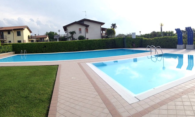 Lazise Apartamento | Encantador apartamento, de un dormitorio finamente renovado, 2 piscinas