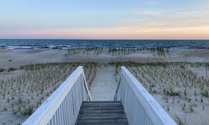 Long Beach Casa | Charming Beachfront Cottage Awaits You! Direct access to beach off deck/walkway.