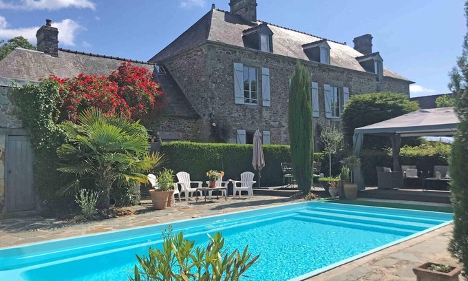 La Chapelle d'Audaine Cabaña | Casa rústica con piscina, jardín y encanto histórico cerca de Bagnoles de l'Orne
