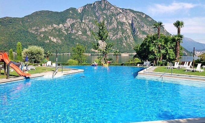 Bissone Apartamento | Charming Gardenview App. 105 by Interhome