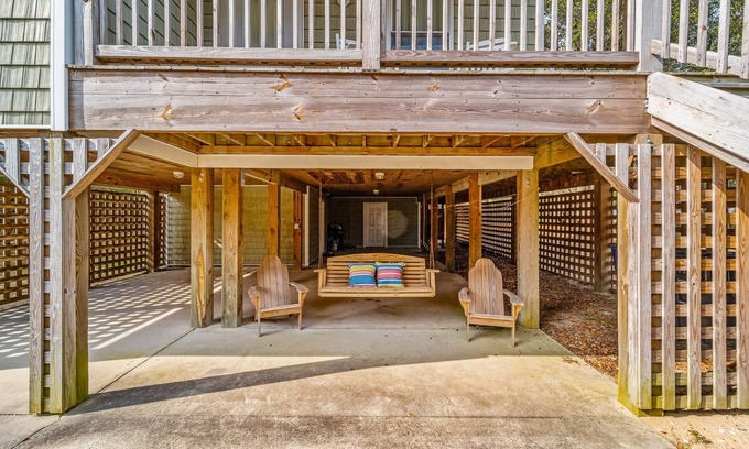 Southern Shores Casa | Charming home with wraparound balcony, central AC, full kitchen, & W/D