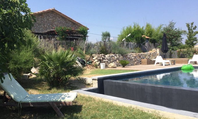 Popian Casa | Nuevo! Antigua casa de piedra con piscina infinita.