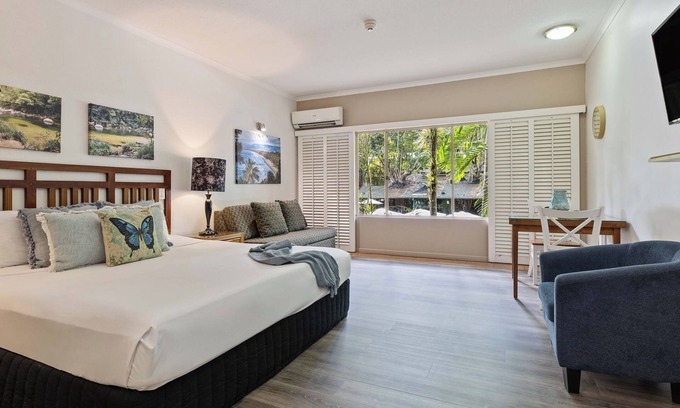 Port Douglas Apartamento | Charming studio with WiFi, fitness room in delightful Port Douglas.