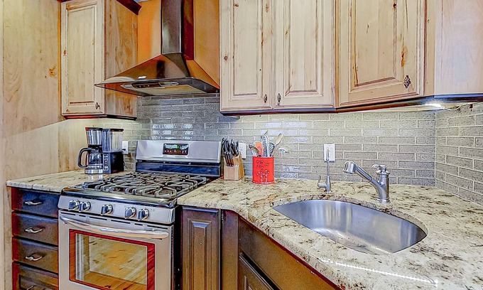 Alton Bay Casa | Charming & sun-filled nature escape with large deck, wood stove, fire pit, & W/D
