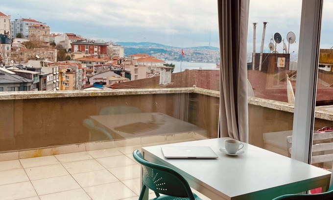 Cihangir Apartamento | Charming terrace apartment in historic Istanbul with dreamy Bosphorus views.