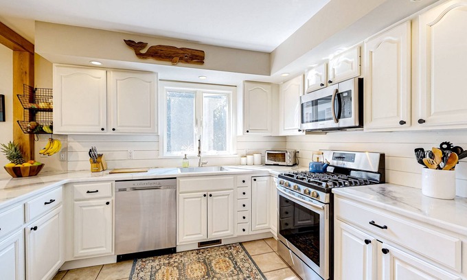 West Tisbury Casa | Charming tree-lined home with outdoor games, firepit, grill, W/D, & AC