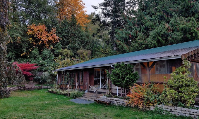 Black Creek Casa | Cheerful 2-bedroom bungalow with a view to a magical fairytale house
