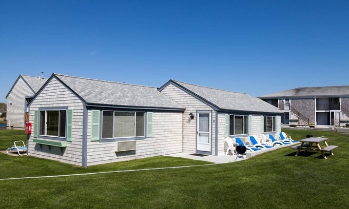 West Yarmouth Casa | Cherish Simple Pleasures in a House by the Beach with Garden Views
