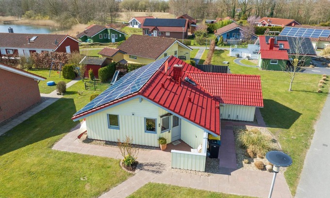 Norderteil Casa | Child-friendly 5-person wellness holiday home Treibholz with two showers and toilets, sauna, whirlpool, wood-burning stove, conservatory and canoe in Otterndorf