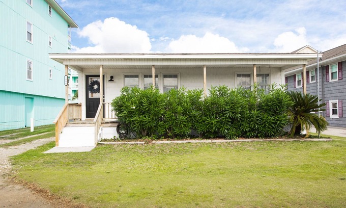 North Carolina Coast Cabaña | Classic Beach Cottage with front porch view of water