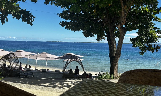 Lapu-Lapu Condominio | Limpio y acogedor con vista al mar condominio de 1 habitación, Mactan New Town, WiFi gratis, piscina, gimnasio, cancha de tenis