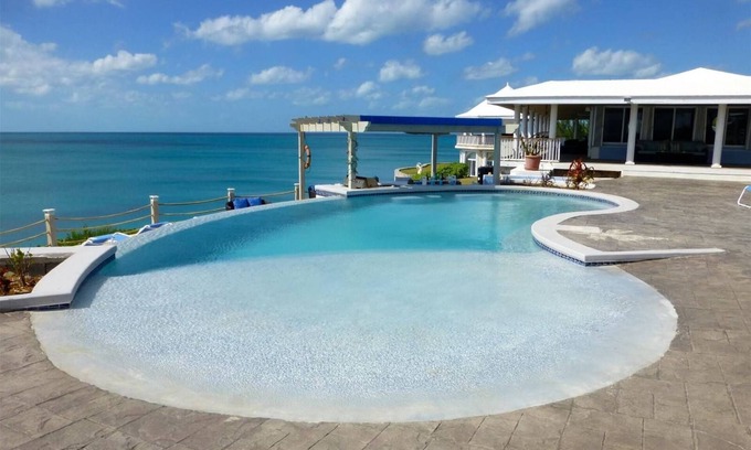 Rainbow Bay Casa | CLIFF-TOP ESTATE CON PISCINA, espectaculares puestas de sol, acceso directo al Caribe