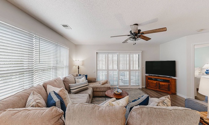 Sea Trail Condominio | Coastal resort condo with on-site pools, hot tub, game room, & golf