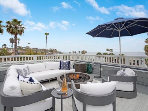 Beach Barber Tract Casa | Coastal retreat near the beach w Panoramic Ocean Views, Rooftop Deck, & Firepit