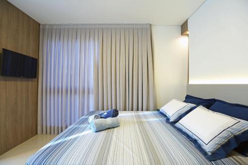 Campeche Central Apartamento | Cobertura Duplex no Campeche Florianópolis, 2 quartos com ar-condicionado, 3 banheiros, WiFi 1Gb, Cozinha completa, Estacionamento, Amplo terraço coberto com churrasqueira