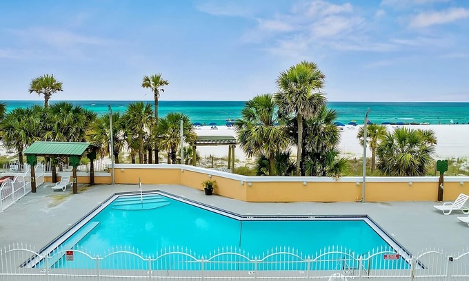 Panama City Beach Hotel | Comfort and Relaxation! 2 Pet-friendly Units, Beachfront Property w/ Pool