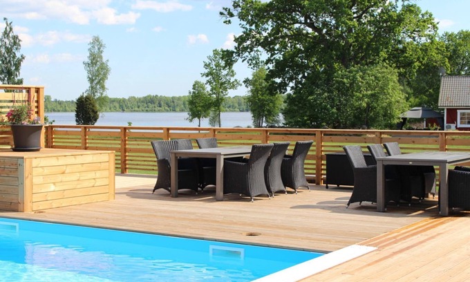 Vackelsang Chalet De Esquí | Comfort holiday home with lake location, motor boat and pool
