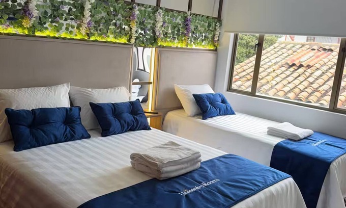 Usaquen Hotel | Comfortable room in Unicentro Rooms for 3 people