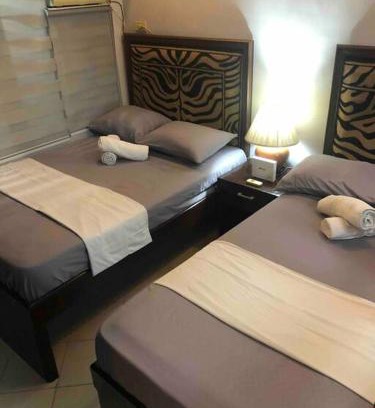 Ermita Apartamento | COMFY 1-BR Condo near SLEC, US Embassy, Malls,Park